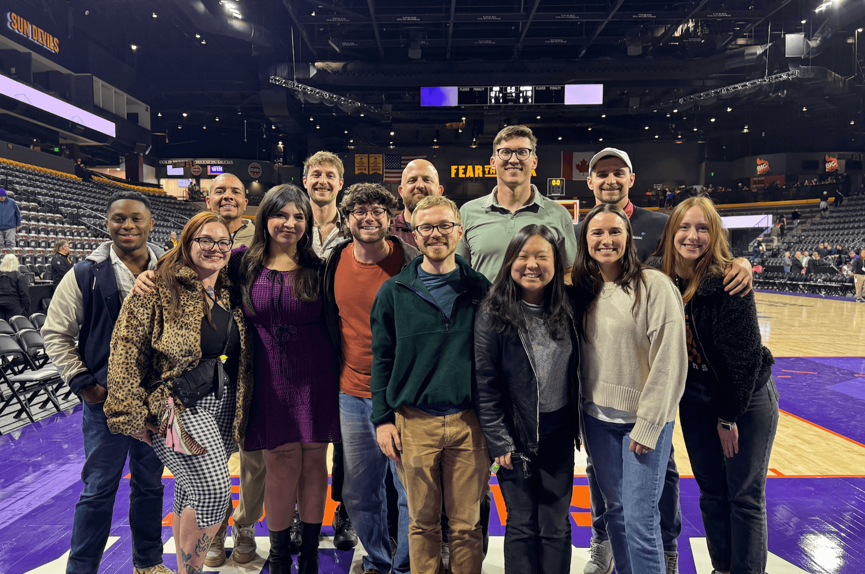 Team at a Suns basketballgame on the court